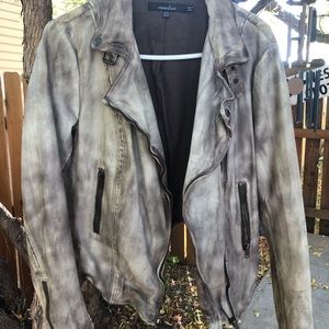 Faux leather jacket.  Distressed look. Fits like 8